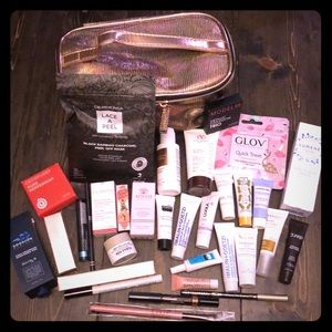 Cosmetic & Skincare lot w/ Boxycharm train case